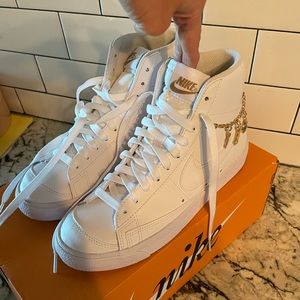 Nike Blazers w gold accents. Chain can be taken off. Perfect condition.